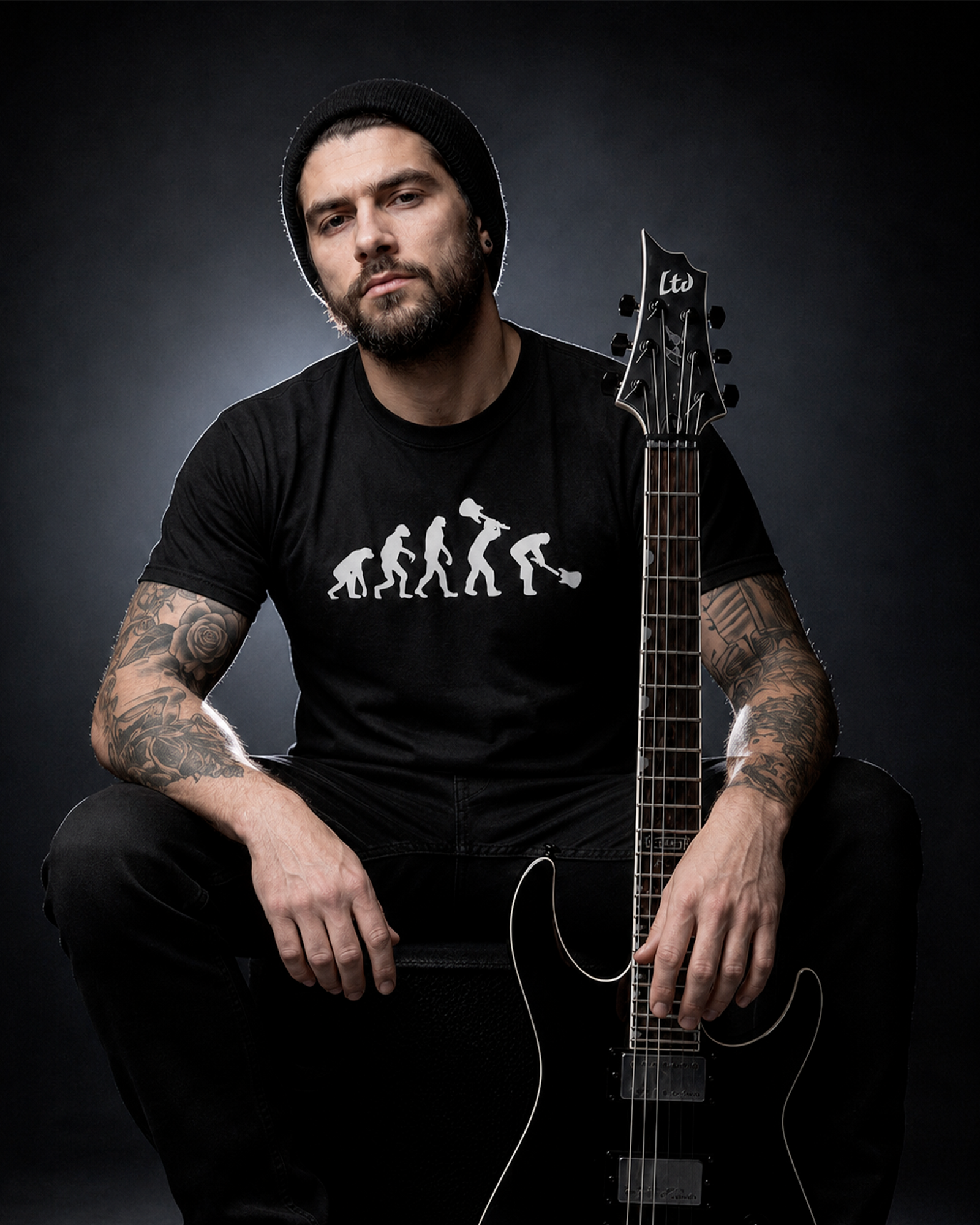 Camiseta Preta Evolução do Homem Rockeiro Antropologia